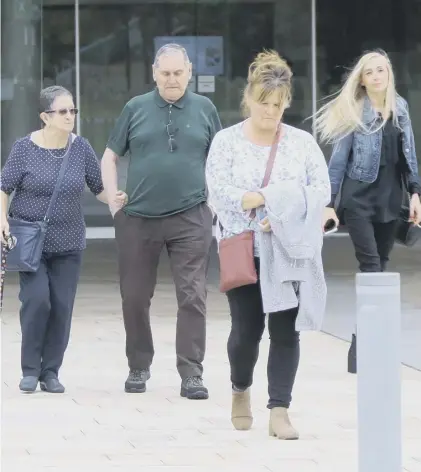  ??  ?? 0 Members of Craig Mcclelland’s grieving family leave the High Court at Livingston after his killer was jailed for life