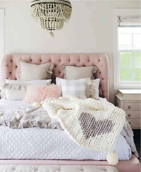  ?? — PHOTOS: ETSY CANADA ?? A chunky knit throw from the Jillian Harris x Etsy Canada collection is perfect for a cosy holiday.