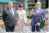  ?? — AP ?? Melania Trumps parents Viktor and Amalija Knavs listen as their attorney Michael Wildes makes a statement in New York on Thursday