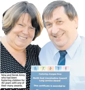  ??  ?? Nina and Derek Airey who had been fostering children for 40 years with one of their many awards.