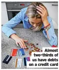  ?? ?? Almost two-thirds of us have debts on a credit card