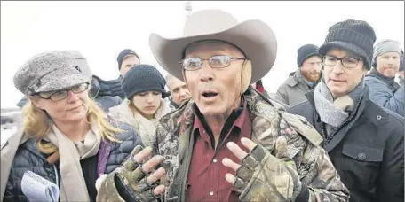  ?? Rick Bowmer
Associated Press ?? ARIZONA RANCHER
LaVoy Finicum speaks on behalf of protesters at the Malheur National Wildlife Refuge near Burns, Ore.