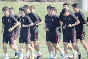  ?? — Reuters ?? South Korea players during training.