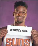  ??  ?? Suns rookie forward Deandre Ayton poses during media day on Monday.