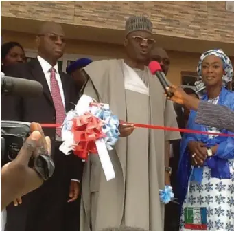  ??  ?? Governor Ahmed cuts the tape to unveil the maternity centre