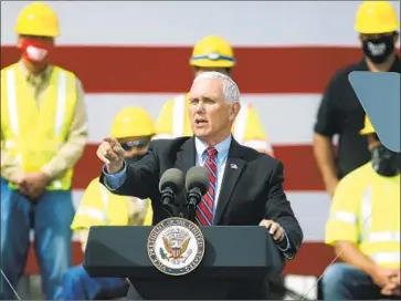  ?? Peter Thomson La Crosse Tribune ?? VICE PRESIDENT Mike Pence campaigns in La Crosse, Wis., on Labor Day. Wisconsin is a key swing state that also saw a visit from Sen. Kamala Harris, her first trip as the Democratic vice presidenti­al nominee.