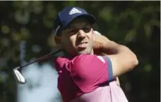  ?? DAVID GOLDMAN/THE ASSOCIATED PRESS ?? Sergio Garcia’s pursuit of a first career major remained on course after a steady round of 70 maintained a share of the Masters lead.