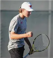  ?? Cassie Stricker/Contributo­r ?? Memorial’s Chase Scholz, pictured, and Egor Morozov lost in doubles, but the Mustangs prevailed 10-9.