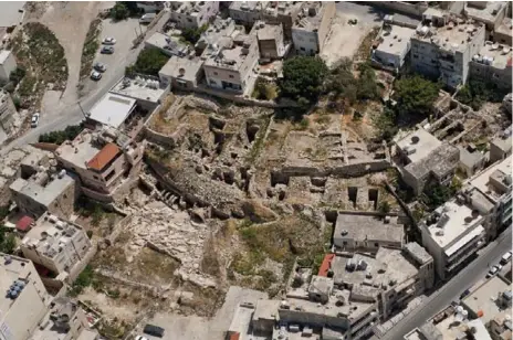  ?? DAVID KENNEDY/THE ASSOCIATED PRESS ?? Extensive constructi­on around archeologi­cal sites has destroyed many ancient structures throughout Jordan. This image is of a site in Madaba.