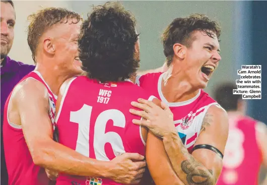  ?? ?? Waratah’s Cam Arnold celebrates the win with teammates. Picture: Glenn Campbell