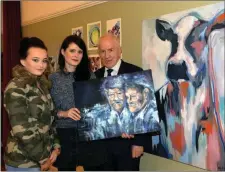  ??  ?? Artist Amy Sheehy and her sister Elise with Jimmy Deenihan, Chairman at the opening of her art exhibition Art & Food - ‘The edible Landscape’ at the 22nd Listowel Food Fair. Photo: Don MacMonagle.