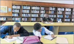  ?? Picture: FILE ?? BOOK WORMS: Pupils do their homework and study at the East London Public Library in the city’s CBD