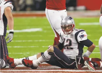  ?? Patrick Smith / Getty Images 2017 ?? Tom Brady didn’t score in the first quarter of last year’s Super Bowl against the Atlanta Falcons, who eventually would lead 28-3 before Brady engineered a Patriots comeback.