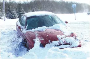  ??  ?? Slip sliding into a snowy ditch is a nightmare for drivers during the winter season