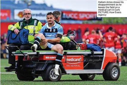  ?? PICTURE: Huw Evans Agency ?? Hallam Amos shows his disappoint­ment as he leaves the field on a medical cart in Cork