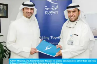  ??  ?? KUWAIT: Ahmad Al Amir, Assistant General Manager for External Communicat­ions at Gulf Bank and Fayez Al-Enezi, Director of PR and Media Department at Kuwait Airways.