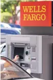  ?? PAT VASQUEZ-CUNINGHAM/JOURNAL ?? A customer uses a drive-up ATM at a Wells Fargo Bank at Masthead and Jefferson NE. Wells Fargo has about 90 branches in New Mexico.