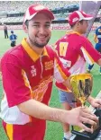  ??  ?? TITLE WIN: Monsoons captain Mark Taviani holds the Bulls Masters Country T20 Challenge trophy after the 2014/15 final.