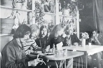  ?? THE MACON TELEGRAPH VIA THE ASSOCIATED PRESS ?? Members of the Allman Brothers Band, from left, Dickey Betts, Duane Allman, Berry Oakley, Butch Trucks, Gregg Allman and Jai Johanny “Jaimoe” Johanson, eating at the H&H Restaurant in downtown Macon, Georgia, in an undated photo. Betts, who co-founded the band, died Thursday at age 80.