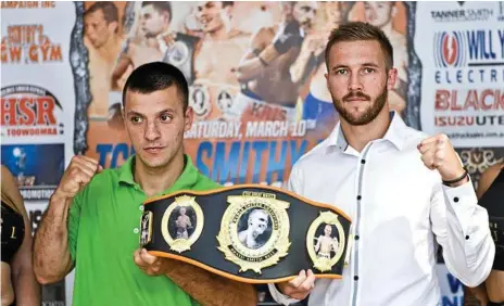  ?? Photo: Nev Madsen ?? SHAPING UP: Argentinia­n boxer Maximillan­o Scalzone (left) and his Saturday night World United Championsh­ip opponent Kris George, of Toowoomba, at yesterday’s fight night media launch.