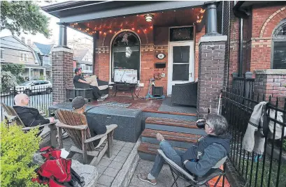  ?? STEVE RUSSELL PHOTOS TORONTO STAR ?? Above: Johnson Yeh hosts a small group of friends to watch Game 6 between the Toronto Maple Leafs and Montreal Canadiens on the porch of his Riverside home.