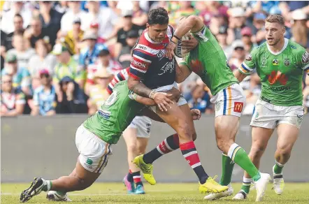  ?? Picture: GETTY IMAGES ?? Roosters star Latrell Mitchell has proved a beast for defences this season.