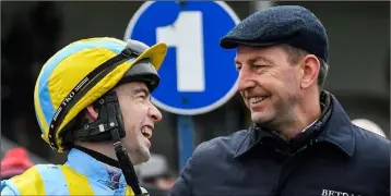  ??  ?? Jonathan Moore shares a joke with trainer Gavin Cromwell after Alfa Mix won in Navan last December.