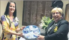  ??  ?? Eibhlin O’Brien, who finished fourth in this year’s lady captain’s prize competitio­n, is pictured here receiving her prize from Carmel Dowling at the presentati­on for that event.