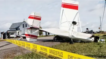  ?? ERROL McGIHON ?? An ultralight aircraft crashed near a home on Old Almonte Road on Tuesday morning.