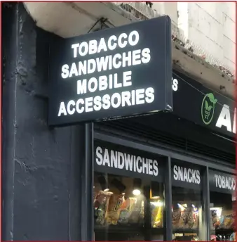  ?? ?? John Bruce, who spotted this sign, says he wouldn’t recommend munching one of those tobacco sandwiches. ‘Very unhealthy,’ he adds. ‘Bread is packed with all those calories, after all’