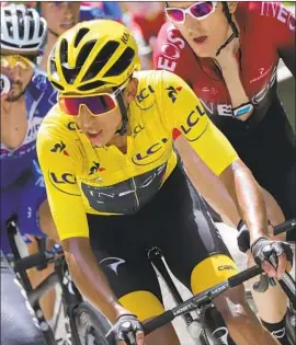  ?? Thibault Camus Associated Press ?? EGAN BERNAL of Colombia, 22, leads the Tour de France going into today’s final stage and would become the youngest post-World War II winner of the race.