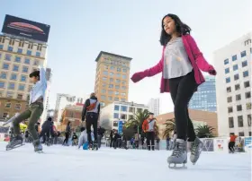  ?? Paul Chinn / The Chronicle ?? Genesis Mendez, 10, glides around the ice at Union Square’s annual holiday skating rink, a great place to spend time enjoying the Christmas season.