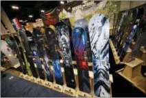  ?? THE ASSOCIATED PRESS ?? Snowboards are on display Thursday at the Mervin Made booth at the opening of the Outdoor Retailers and Snow Show in the Colorado Convention Center in Denver.