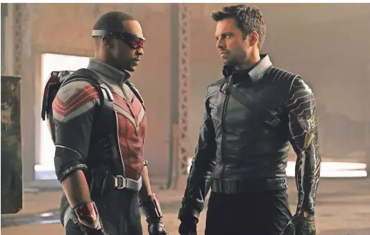  ?? FOTO: CHUCK ZLOTNICK/DPA ?? Sam Wilson (l., Anthony Mackie)
spielt Falcon, Sebastian Stan (r.) den Winter
Soldier alias Bucky Barnes.