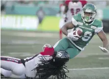  ?? THE CANADIAN PRESS ?? Saskatchew­an Roughrider­s running back William Powell runs the ball against the Ottawa Redblacks on Saturday.