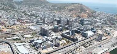  ??  ?? CHALLENGIN­G TIMES: An aerial view of central Cape Town, which has been experienci­ng enviable growth. Despite this, the Central City Improvemen­t District has sounded the alarm over economic and political turbulence.