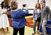  ?? John Breunig/Hearst Connecticu­t Media ?? Andrew McCarthy, right, posed with fans at Ferguson Library in Stamford on Thursday.