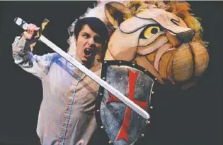  ?? PHOTO BY CHUCK TUTTLE ?? Jack Smith, shown, and Cameron Legge share the role of Peter, who fights alongside noble lion Aslan in “The Lion, the Witch & the Wardrobe.”