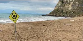  ?? ?? No-swimming signs were erected at Waipatiki Beach, north of Napier, one of the places for where coastal warnings were issued yesterday.