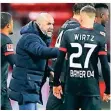  ?? FOTO: DPA ?? Peter Bosz im Gespräch mit Florian Wirtz.