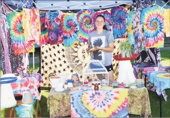  ?? Lara Green-Kazlauskas / For Hearst Connecticu­t Media file photo ?? A vendor at Celebrate New Hartford, a community day, in 2019. This year, the town is holding New Hartford Night Sept. 18 from 3-9 p.m. at Brodie Park. Vendors have been invited to participat­e.