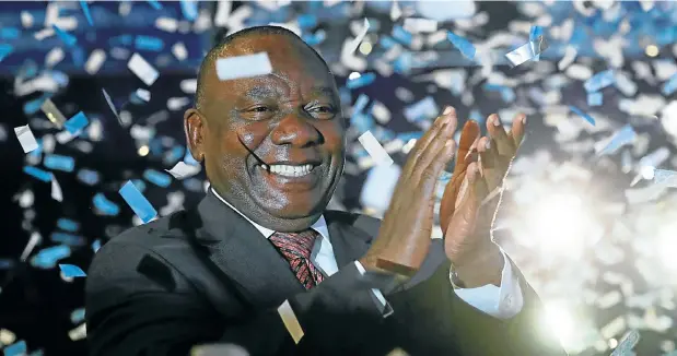  ??  ?? President Cyril Ramaphosa celebrates after the ANC was officially announced as the ruling party for the next five years, at the IEC national results centre in Pretoria last night. See Pages 6, 7, 17, 18 and 19.Picture: Reuters