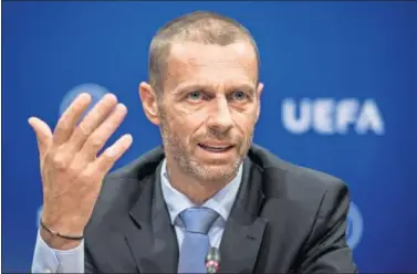  ??  ?? DESAFÍO. Aleksander Ceferin habla durante el Congreso Extraordin­ario de la UEFA en Ginebra.