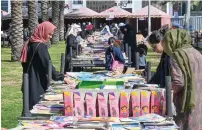  ?? — photo by m. sajjad ?? The used book festival saw students and book lovers browse through hundreds of choice titles on Wednesday.