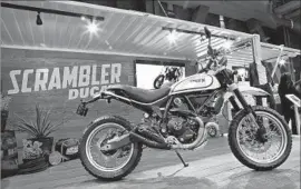  ?? Myung J. Chun Los Angeles Times ?? MANY believe the motorcycle industry is facing a crisis. Among problems cited in a survey was insufficie­nt outreach to new riders. Above, a Ducati Scrambler.