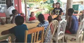  ??  ?? Learning alongside local children at Bequia in the Grenadines