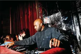  ?? AMY LOMBARD/THE NEW YORK TIMES ?? Virgil Abloh in D.J. mode at a party hosted by Garage magazine at Rose Bar in New York on Feb. 9, 2018. Abloh, who died on Nov. 29 at 41, repurposed an ethic from hip-hop and skateboard­ing, two cultural pursuits premised upon the provocativ­e and ultimately correct misuse of what came before.