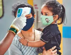  ?? PTI ?? A child is screened in Bengaluru. Currently, three vaccines being administer­ed in the country are only for those above 18.