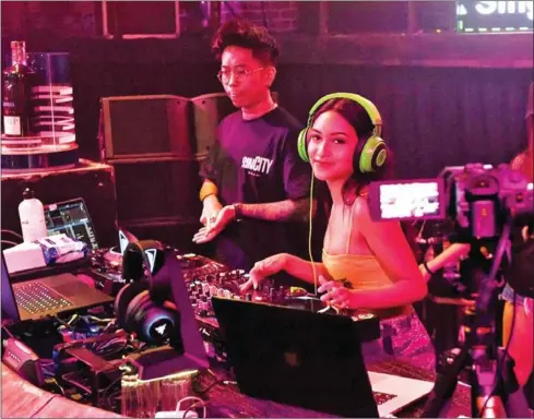  ?? AFP ?? To remain relevant, some clubs have started putting their DJs and music performanc­es online.