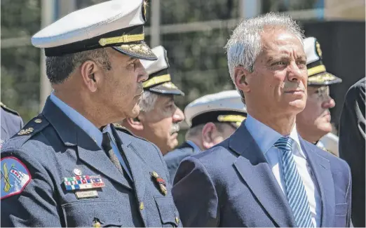 ?? ASHLEE REZIN/SUN-TIMES ?? Sources say Fire Commission­er Jose Santiago and Mayor Rahm Emanuel (shown in June) have had their “goodbye conversati­on.”
